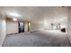 Open basement area with carpeted flooring and ample space for activities at 7709 Santolina Dr, Indianapolis, IN 46237