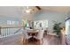 Dining room with high vaulted ceilings, hardwood floors, and lots of natural light at 7709 Santolina Dr, Indianapolis, IN 46237