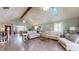 Bright living room with high ceilings, hardwood floors, and lots of natural light at 7709 Santolina Dr, Indianapolis, IN 46237