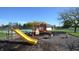Community playground with slides, swings and other play equipment at 7709 Santolina Dr, Indianapolis, IN 46237