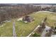 Sprawling two-story brick home on a large lot with circular driveway at 9263 Compton Farm Ln, Indianapolis, IN 46259