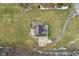 An overhead view of the house showing the patio, driveway, and professional landscaping at 9263 Compton Farm Ln, Indianapolis, IN 46259