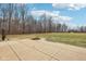 An expansive backyard features a stone patio and firepit that's perfect for entertaining at 9263 Compton Farm Ln, Indianapolis, IN 46259