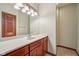 Bathroom with a large mirror, long vanity and bright lights at 9263 Compton Farm Ln, Indianapolis, IN 46259