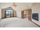 Large bedroom features vaulted ceiling, gas fireplace, and large windows for natural light at 9263 Compton Farm Ln, Indianapolis, IN 46259