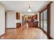 This kitchen has hardwood floors and a sliding glass door to the patio at 9263 Compton Farm Ln, Indianapolis, IN 46259