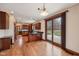 A stunning kitchen with hardwood floors and a sliding glass door to the patio at 9263 Compton Farm Ln, Indianapolis, IN 46259