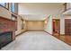 Spacious room with plush carpeting, a fireplace, and ample natural light at 9263 Compton Farm Ln, Indianapolis, IN 46259