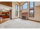 Open-concept living space with a fireplace and lots of natural light at 9263 Compton Farm Ln, Indianapolis, IN 46259