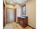 Mudroom sink with dark cabinetry and bright natural light at 9263 Compton Farm Ln, Indianapolis, IN 46259