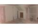 Unfinished attic bedroom with sloped ceilings and a small closet at 139 S Jefferson St, Martinsville, IN 46151