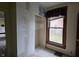 Small bedroom with large window and closet at 139 S Jefferson St, Martinsville, IN 46151