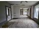 Large living area with hardwood floors, needs updating at 139 S Jefferson St, Martinsville, IN 46151