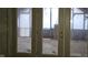 View of unfinished patio through French doors at 139 S Jefferson St, Martinsville, IN 46151