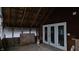 Unfinished sunroom with double doors and exposed framing at 139 S Jefferson St, Martinsville, IN 46151