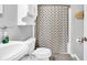 Clean bathroom with a shower/tub combo and a neutral color scheme at 141 S Meridian St # 605, Indianapolis, IN 46225
