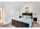 Cozy bedroom with double bed, carpet flooring, and a closet at 141 S Meridian St # 605, Indianapolis, IN 46225