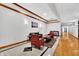 Elegant hallway with seating and hardwood floors at 141 S Meridian St # 605, Indianapolis, IN 46225