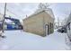 Detached block garage in snowy backyard at 1819 Southeastern Ave, Indianapolis, IN 46201