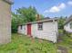 Back exterior of garage with red door at 1819 Southeastern Ave, Indianapolis, IN 46201