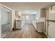 Efficient kitchen featuring white cabinets and vinyl flooring at 1819 Southeastern Ave, Indianapolis, IN 46201