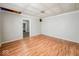 Simple living room with light walls and wood floors at 1819 Southeastern Ave, Indianapolis, IN 46201