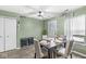 Bright dining room with a table and four chairs near a door at 2021 Fullwood Dr, Brownsburg, IN 46112