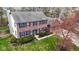 An aerial view of a two-story brick home with a three-car garage and nice landscaping at 20485 Country Pine Ct, Noblesville, IN 46062