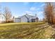 Spacious backyard with two-story home and screened porch at 20485 Country Pine Ct, Noblesville, IN 46062