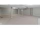 Unfinished basement provides potential with gray walls, neutral carpet, and support columns at 20485 Country Pine Ct, Noblesville, IN 46062