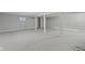 Spacious basement with gray carpet, white columns, and ample room for recreation or storage at 20485 Country Pine Ct, Noblesville, IN 46062