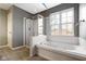 Bathroom with shower and a jetted bathtub at 20485 Country Pine Ct, Noblesville, IN 46062
