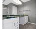 Double vanity bathroom with green marble countertop at 20485 Country Pine Ct, Noblesville, IN 46062