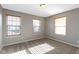 Well-lit bedroom with neutral walls and carpet at 20485 Country Pine Ct, Noblesville, IN 46062