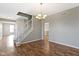 Spacious dining room with hardwood floors and view of staircase at 20485 Country Pine Ct, Noblesville, IN 46062