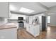 Bright kitchen featuring white cabinets, an island, and stainless steel appliances at 20485 Country Pine Ct, Noblesville, IN 46062