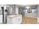 Eat-in kitchen with stainless steel refrigerator and easy access to the living room at 20485 Country Pine Ct, Noblesville, IN 46062