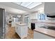 Eat-in kitchen with stainless steel refrigerator and easy access to the living room at 20485 Country Pine Ct, Noblesville, IN 46062