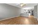 Open-concept living room featuring wood floors and easy access to kitchen at 20485 Country Pine Ct, Noblesville, IN 46062