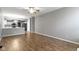 Open-concept living room featuring wood floors and easy access to kitchen at 20485 Country Pine Ct, Noblesville, IN 46062