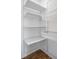 Large closet with wire baskets and ample shelving at 220 N Beville Ave, Indianapolis, IN 46201