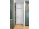 Clean hallway with a pocket door and built-in shelving at 220 N Beville Ave, Indianapolis, IN 46201