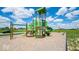 Community playground with swings and play structure at 241 Ames Dr, Whiteland, IN 46184