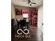 Bright dining area with dark floors and red accents at 2714 Baltimore Ave, Indianapolis, IN 46218