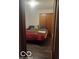 Cozy bedroom with a queen bed and ample closet space at 3915 Brookville Rd, Indianapolis, IN 46201