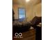 Cozy bedroom with a double bed and window at 3915 Brookville Rd, Indianapolis, IN 46201