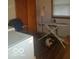 Laundry room with an ironing board and exercise bike at 3915 Brookville Rd, Indianapolis, IN 46201