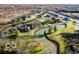 Aerial view of luxurious estate home with expansive grounds and water features at 4601 N Legacy Dr, Muncie, IN 47304
