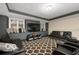 Finished basement with comfortable seating and large TV at 4601 N Legacy Dr, Muncie, IN 47304