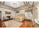 Luxurious main bedroom with hardwood floors and ornate ceiling details at 4601 N Legacy Dr, Muncie, IN 47304